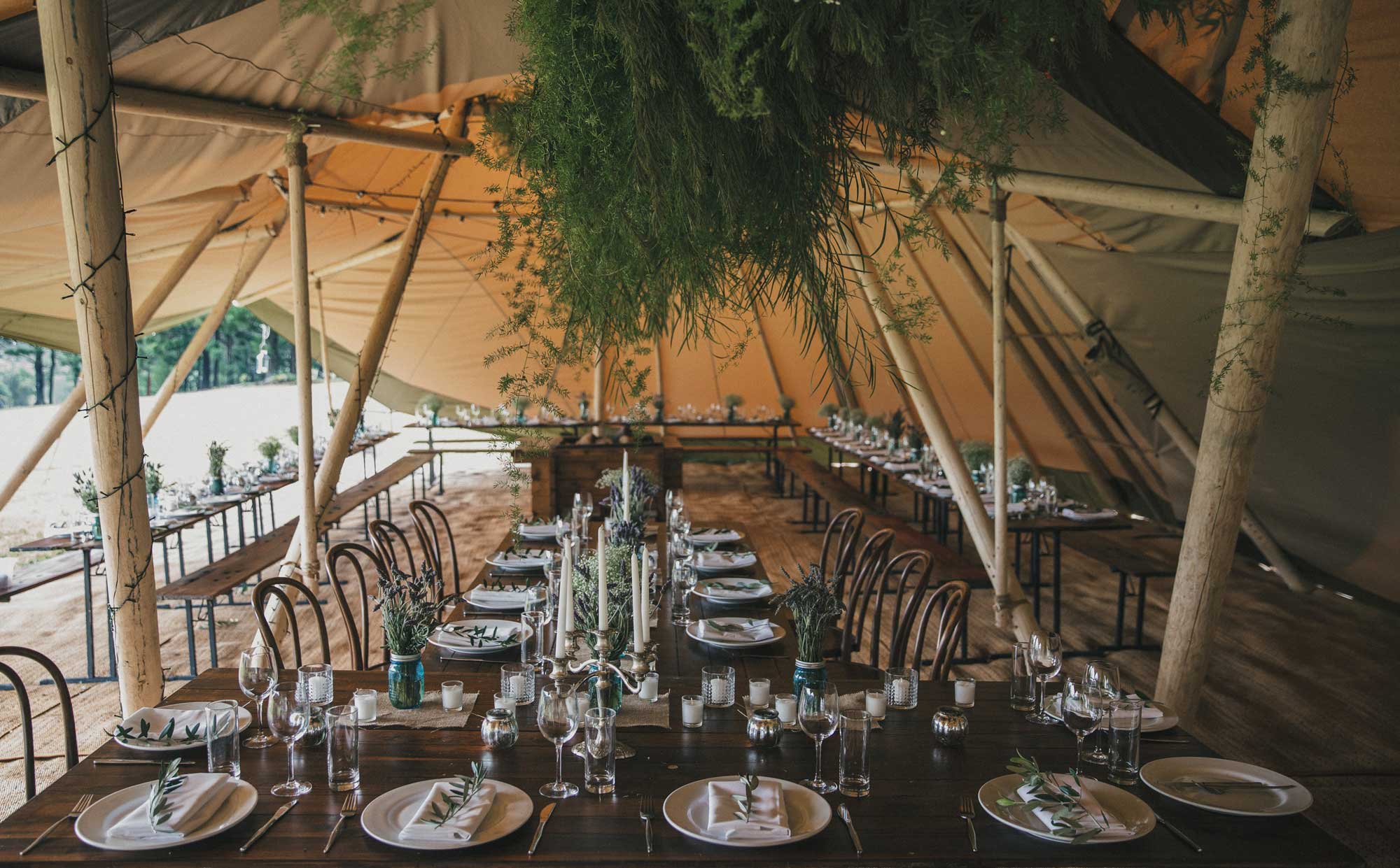 inside the tipis wedding set up